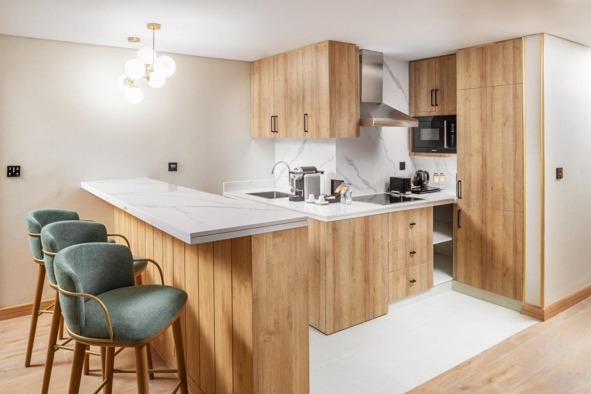 Taiba Suites Madinah Medina Exteriör bild A kitchen in a serviced apartment