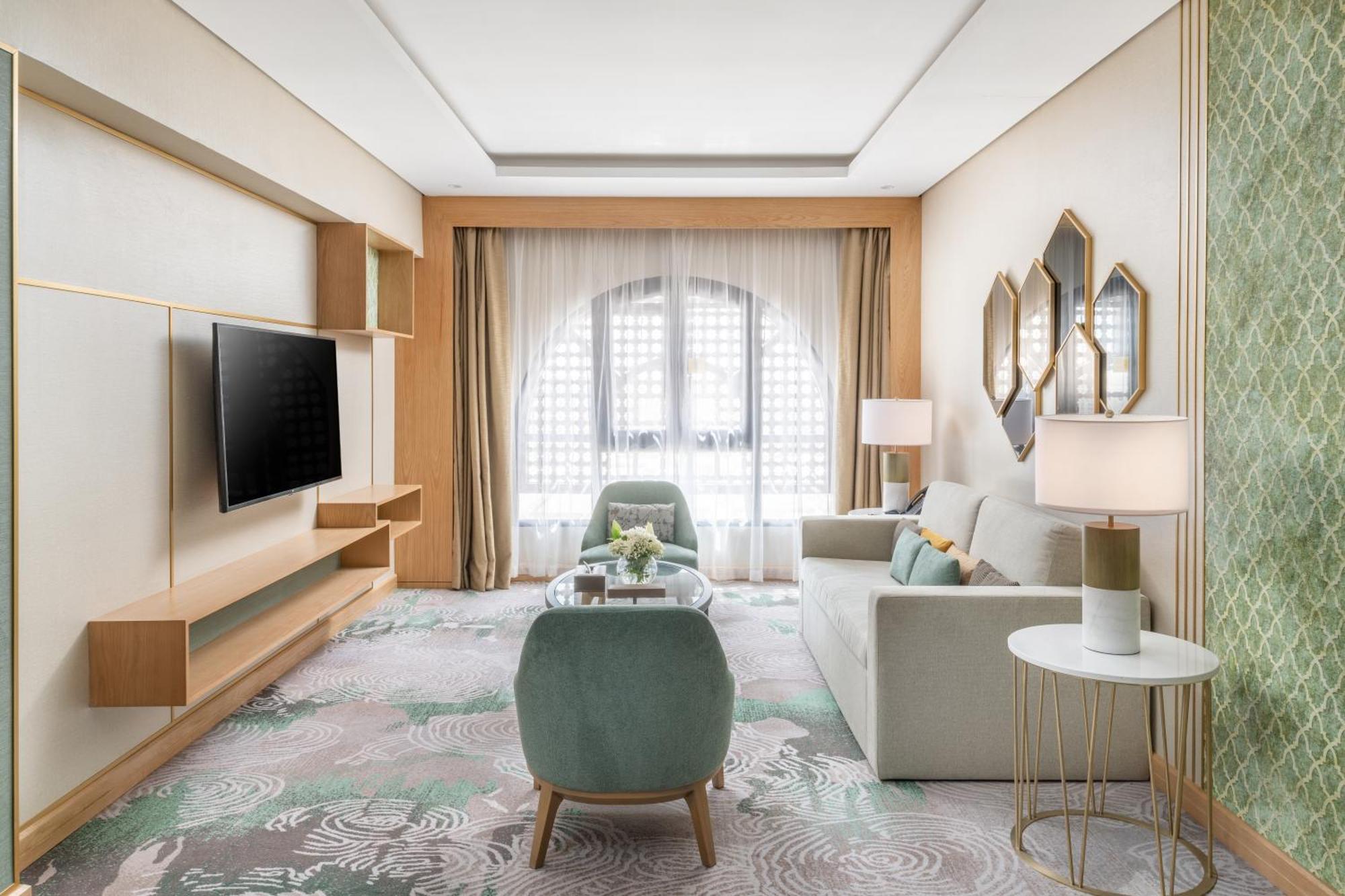 Taiba Suites Madinah Medina Exteriör bild A living room at the hotel