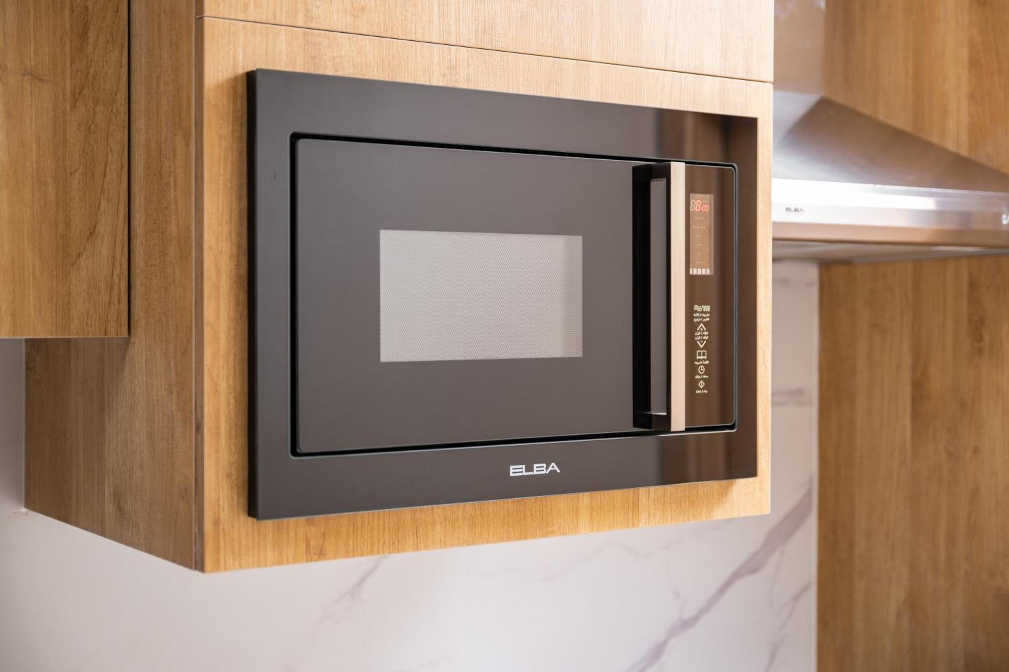Taiba Suites Madinah Medina Exteriör bild Microwaves are a common household appliance.
